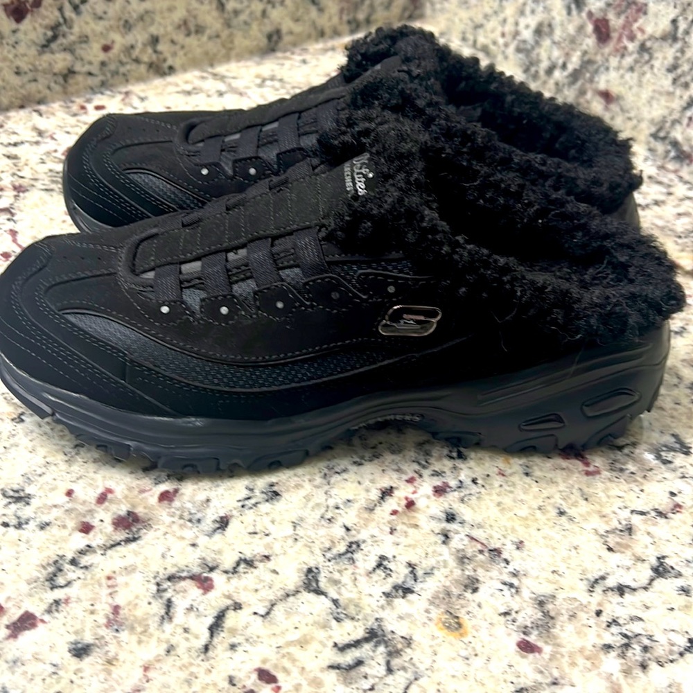 Women’s skechers fleece lined air cooled memory foam slip on sneakers